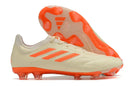 Chuteira Adidas Copa Pure+ FG Laranja com design vibrante e solado FG para desempenho em campo.