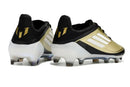 Chuteira Adidas F50.1 FG Dourada, Preta e Branca: visualizar parte traseira com detalhes em dourado e preto.