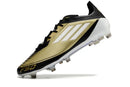 Chuteira Adidas F50.1 FG Dourada, Preta e Branca em destaque com design elegante e desempenho em campo.