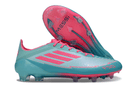 Chuteira Adidas f50 Elite FG - Azul e Rosa com design vibrante e tecnologia de ponta para desempenho no futebol.
