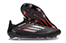 Chuteira Adidas F50 Elite FG - Preta e Vermelha com design elegante e tecnologia FG para desempenho em campo.