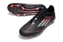 Chuteira Adidas F50 Elite FG - Preta e Vermelha, design elegante e funcional, ideal para jogadores de futebol.