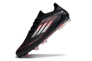 Chuteira Adidas F50 Elite FG - Preta e Vermelha com design elegante e funcional, ideal para desempenho em campo.