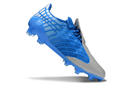 Chuteira Adidas F50 Elite FG Spider Azul em destaque com design moderno e tecnologia Spider.