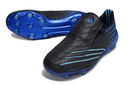 Chuteira Adidas F50 Elite FG Spider Preta e Azul com design aerodinâmico e sola FG para futebol em campos naturais.