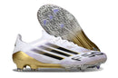Chuteira Adidas F50 FG Elite Branca e Dourada com design leve e tecnologia avançada.