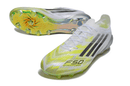 Chuteira Adidas F50 FG Elite - Branca e Verde, mostrando design inovador e cores vibrantes.