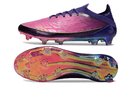 Chuteira Adidas F50 FG Elite Lamine Yamal Roxa e Rosa com design vibrante e sola de travas para desempenho em campo.