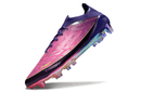 Chuteira Adidas F50 FG Elite Lamine Yamal Roxa e Rosa destacando seu design vibrante e moderno.