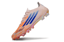 Chuteira Adidas F50 FG Elite - Laranja em destaque, ideal para desempenho em campo.