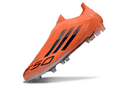 Chuteira Adidas F50 FG Elite Laranja e Preta, destacada com design moderno e cores vibrantes.