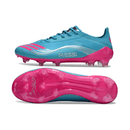 Chuteira Adidas F50 FG Elite - Ed. "Messi" Azul com sola rosa vibrante, ideal para velocidade e controle em campos.