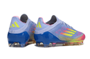 Chuteira Adidas F50 FG Elite Roxa, Rosa e Verde vista traseira com cores vibrantes e design moderno.