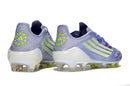 Chuteira Adidas F50 FG Elite Sparkfusion - Azul, vista traseira com detalhes vibrantes em design moderno.