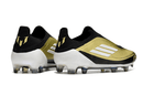 Chuteira Adidas F50 LL FG - Dourada e Branca com design elegante e desempenho superior para jogadores.
