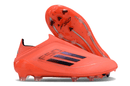 Chuteira Adidas F50 LL FG - Laranja e Preta com design leve e tecnologia para performance em campo.