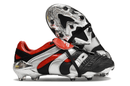 Chuteira Adidas Predator Accelerator FG - Preta e Vermelha com design esportivo e detalhes em vermelho e prateado.
