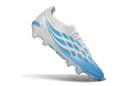 Chuteira Adidas Predator Elite FG 26 - Azul e Rosa, com design elegante e tecnologia Controlskin para performance em campo.