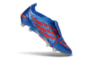 Chuteira Adidas Predator Elite FG 26 - Azul e Vermelha, design icónico para futebolistas, tecnologia Controlskin para maior precisão.