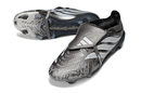 Chuteira Adidas Predator Elite FG 26 - "Finishers Steel" Prateada em detalhe, destacando design e tecnologia de ponta.