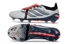Chuteira Adidas Predator Elite FG 26 - "Finishers Steel" com design inovador e sola FG para firmeza em campo.
