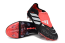 Chuteira Adidas Predator Elite FG 26 - Preta e Branca com design moderno e tecnologia avançada