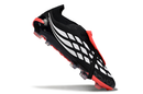 Chuteira Adidas Predator Elite FG 26 - Preta e Branca com detalhes em vermelho, ideal para controle de bola em campo.