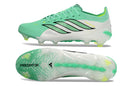 Chuteira Adidas Predator Elite FG 26 - Verde e Branca vista lateral e inferior, ideal para controle em campo.