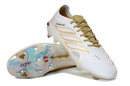 Chuteira Adidas Predator Elite FG 26 - Ed. "Zidane" com design em verde e branca, perfeita para o futebol profissional.