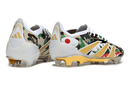 Chuteira Adidas Predator Elite FG - Bape com design icônico e sola FG para máxima aderência e controle.