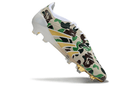 Chuteira Adidas Predator Elite FG - Bape com design camuflado e sola FG para controle e precisão no campo.