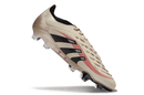 Chuteira Adidas Predator Elite FG - Bege e Preta em vista lateral, destacando design e tecnologia de controle.