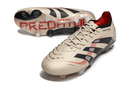 Chuteira Adidas Predator Elite FG - Bege e Preta, design clássico com tecnologia avançada para jogadores que buscam controle.