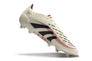 Chuteira Adidas Predator Elite FG - Bege, Preta e Vermelha com design tricolor sofisticado e tecnologia avançada.