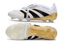 Chuteira Adidas Predator Elite FG Tongue Branca e Dourada em ângulo mostrando design e detalhes de estilo