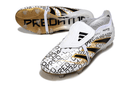 Chuteira Adidas Predator Elite FG Tongue Branca e Dourada com design elegante e alta performance.