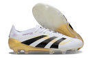 Chuteira Adidas Predator Elite FG - Branca e Dourada com design icônico e tecnologia avançada para futebol.