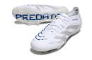 Chuteira Adidas Predator Elite FG - Branca modelo com sola FG e design avançado, ideal para jogadores de futebol.