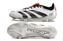 Chuteira Adidas Predator Elite FG - Branca e Preta, vista lateral e inferior, design elegante e desempenho em campo.