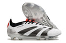 Chuteira Adidas Predator Elite FG - Branca e Preta com design elegante e tecnologia avançada para desempenho em campo.
