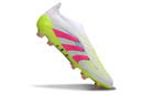 Chuteira Adidas Predator Elite FG - Branca, Rosa e Amarela com design moderno em campo.