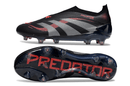 Chuteira Adidas Predator Elite FG Laceless - Preta e Vermelha, design arrojado e tecnologia de ponta para desempenho no campo.