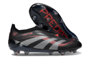 Chuteira Adidas Predator Elite FG Laceless - Preta e Vermelha em destaque, mostrando design moderno e tecnologia avançada.