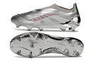 Chuteira Adidas Predator Elite FG LL - Prateada Ed. "Bellingham" vista lateral e inferior em prateado, design exclusivo para performance.
