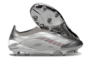 Chuteira Adidas Predator Elite FG LL - Prateada Ed. "Bellingham" com design sofisticado e tecnologia de ponta.