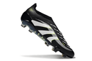 Chuteira Adidas Predator Elite FG - Preta e Amarela apresentada em ângulo lateral, destacando seu design moderno e tecnologia avançada.