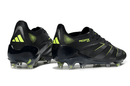 Chuteira Adidas Predator Elite FG - Preta e Amarela vistas traseiras mostrando design moderno e cores vibrantes.