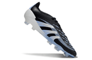 Chuteira Adidas Predator Elite FG - Preta e Azul Ed. "Bellingham" em ângulo, destacando design moderno e performance.