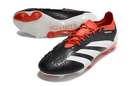 Chuteira Adidas Predator Elite FG - Preta, Branca e Laranja com design vibrante e tecnologia avançada.