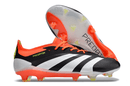 Chuteira Adidas Predator Elite FG - Preta, Branca e Laranja com design tricolor vibrante e tecnologia avançada.